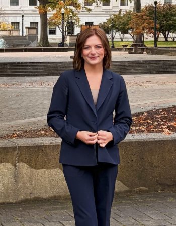 Woman standing in front of a building