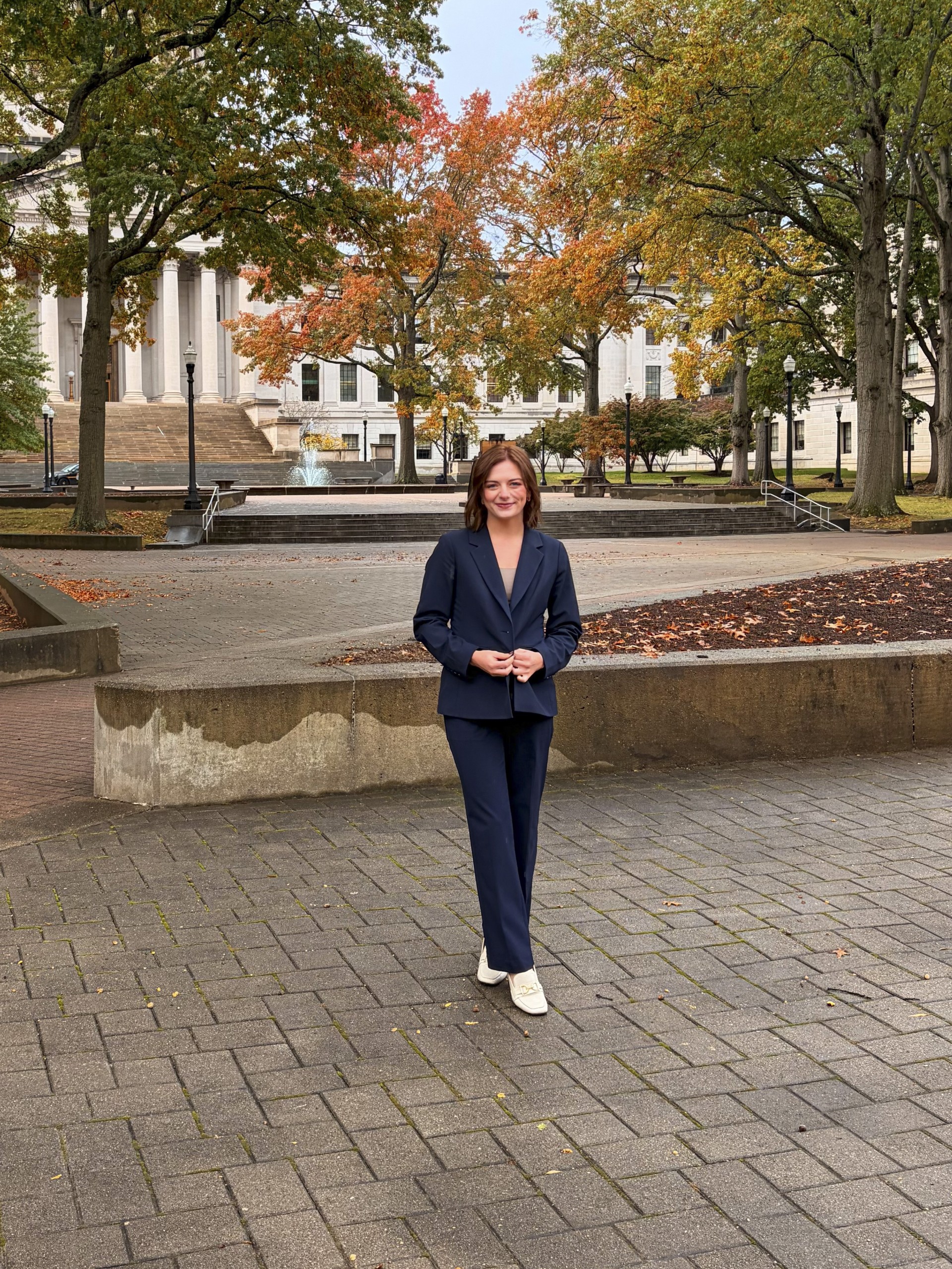 Woman standing in front of a building